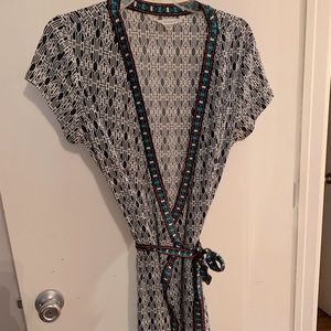 👚3/$20. Women’s size large wrap dress
